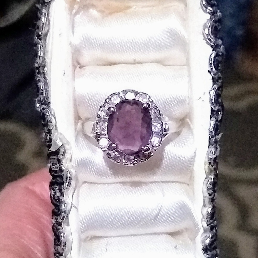 Beautiful cocktail ring with purple stone